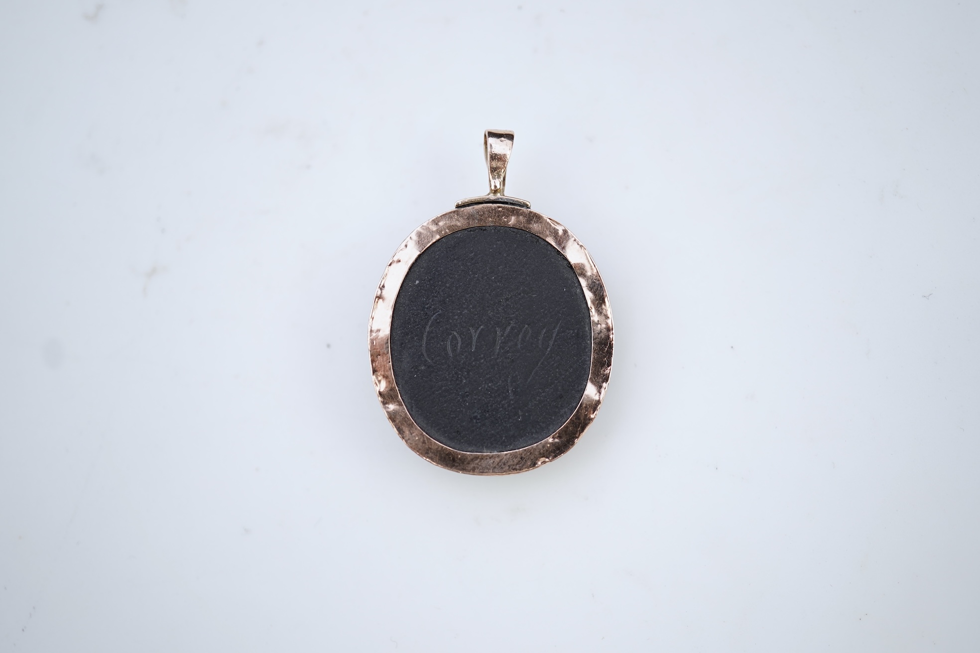 An unusual lava cameo pendant, late 19th century